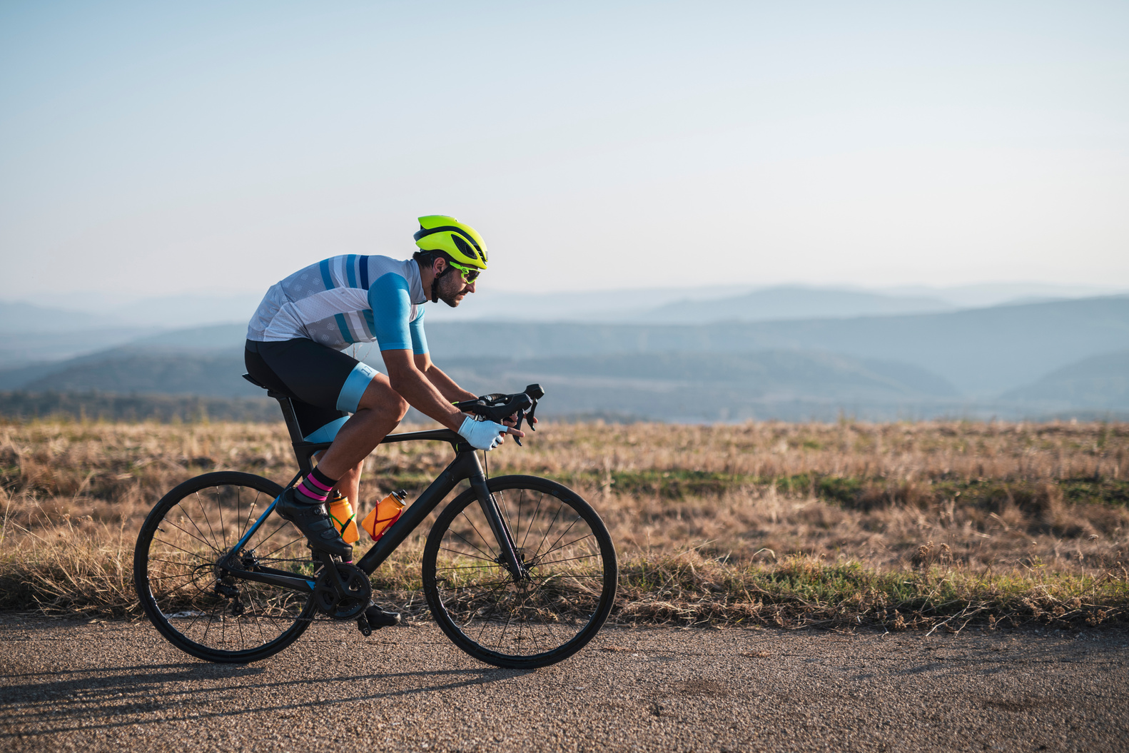 Man cycling outdoors